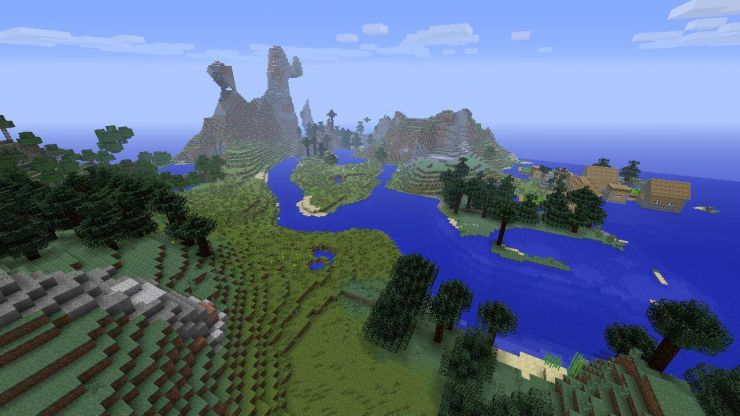 A Minecraft seed with a village, mountains, ocean, and plains right at the start